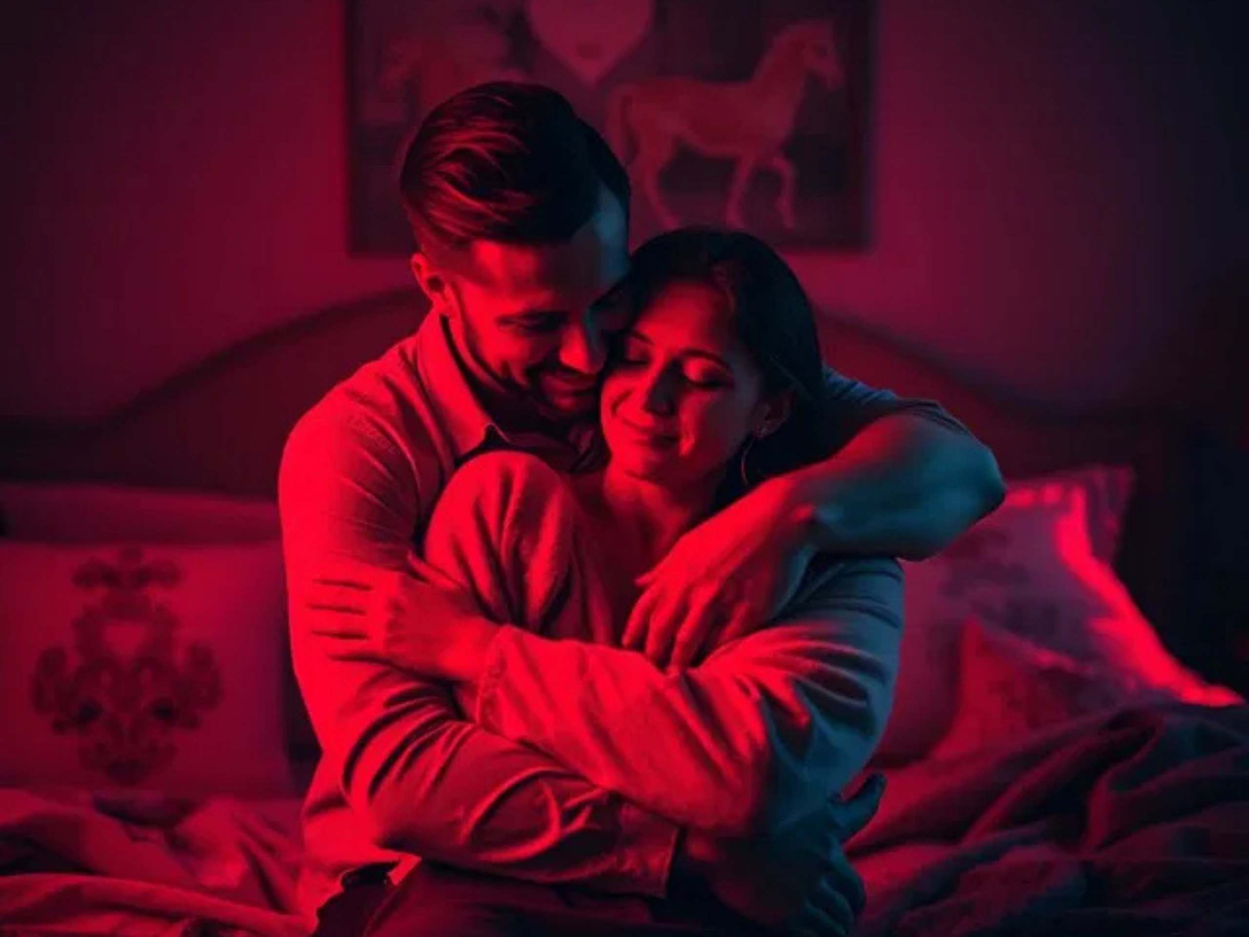 couple In red light room